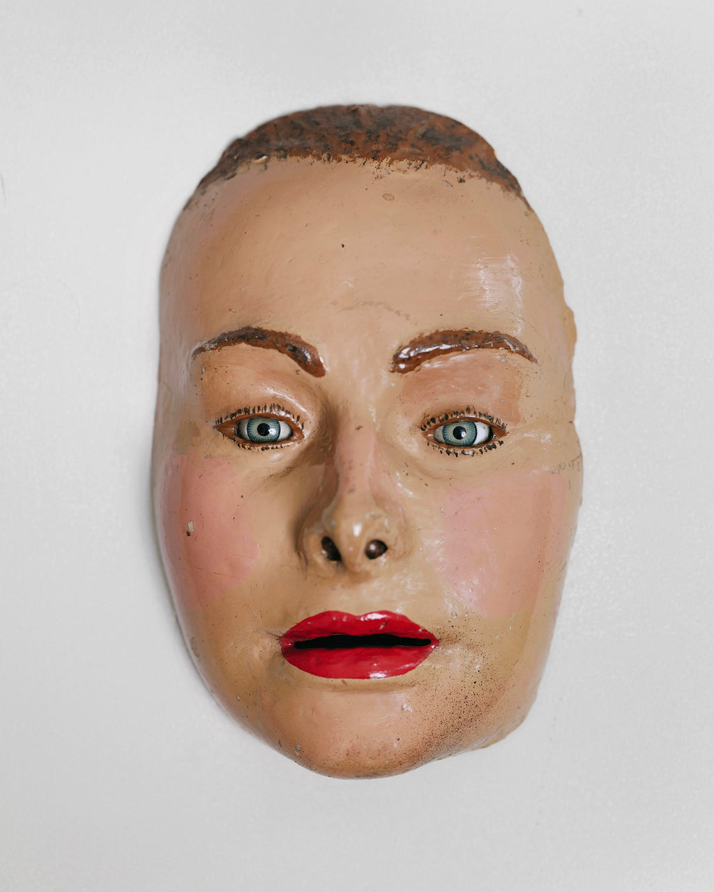 Vintage fiberglass mask with glass eyes