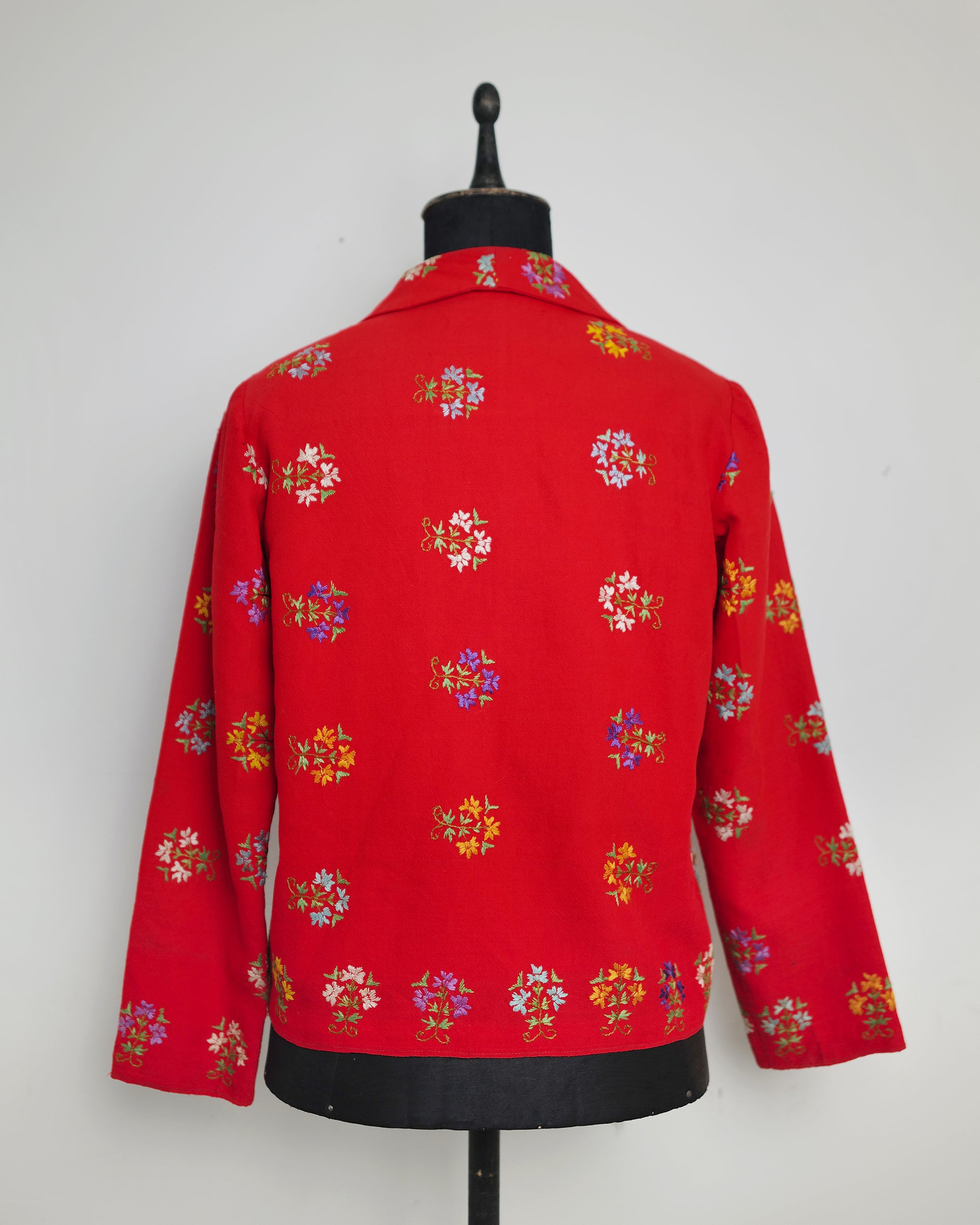 Vintage red wool Jacket with floral embroidery.