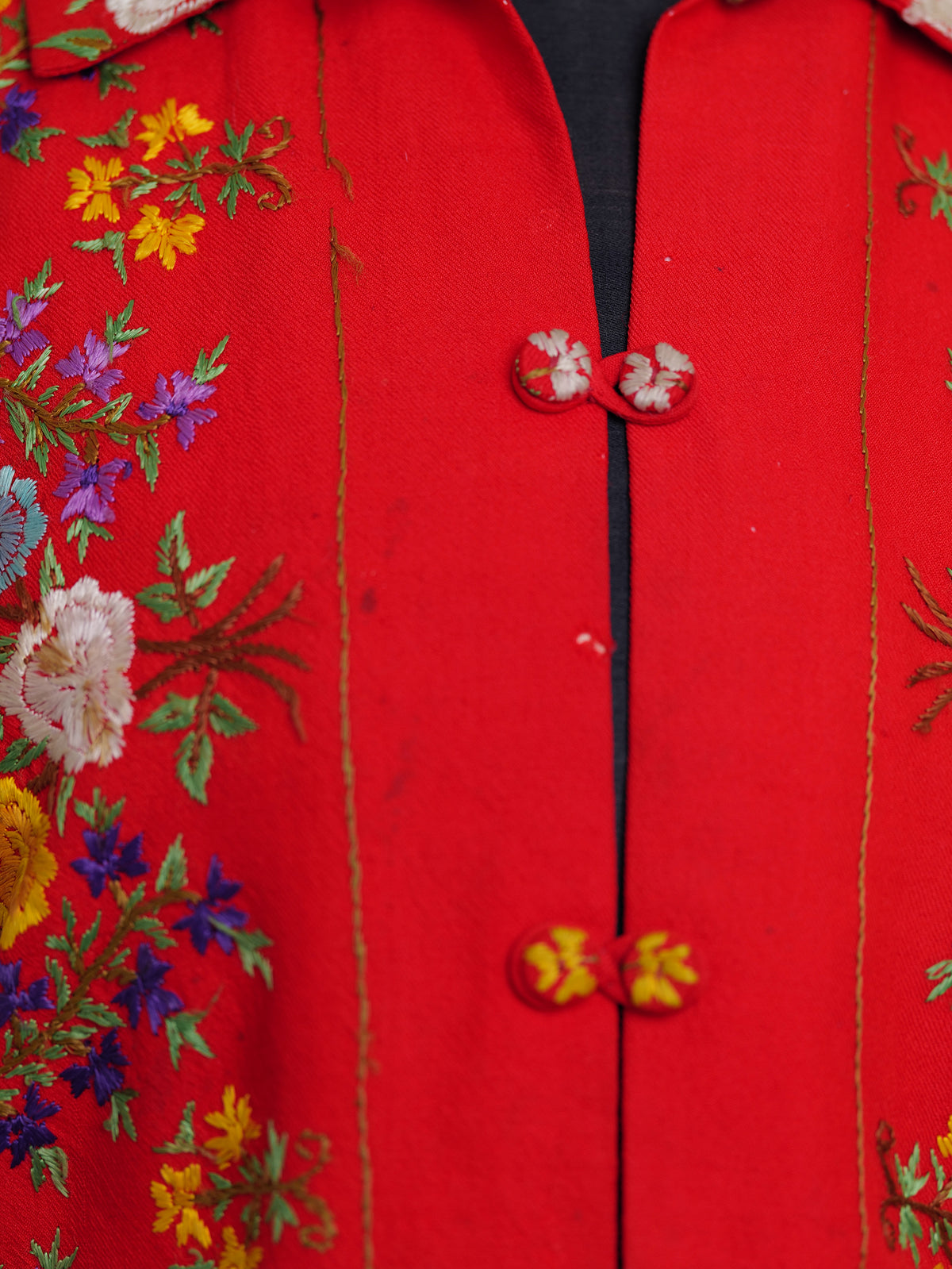 Vintage red wool Jacket with floral embroidery.
